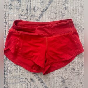 Red/Orange Lululemon Speed up shorts 2.5”